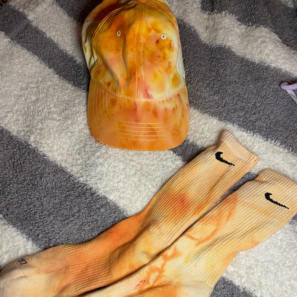 Matching orange tie dyed hat and Nike socks